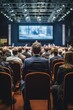 © visoot - Crowded Audience at a Business Conference, Corporate Delegate Watching Inspirational Entrepreneurship Presentation About Developing Markets and Financial Opportunities.