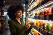 © lucky pics - young adult African American woman choosing a product in a grocery store. Neural network generated image. Not based on any actual person or scene.