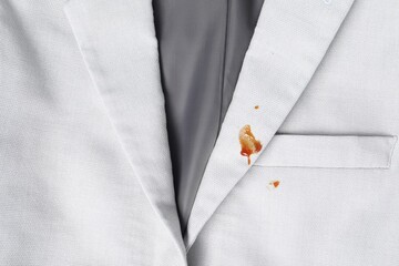 Canvas Print - Dirty jacket with stains of sauce, top view