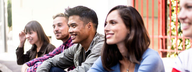 Horizontal banner or template with multicultural people group without smart phone at university college backyard -  Happy millennial friends having fun together sitting at the street