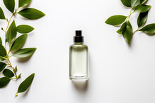 Natural Cosmetic Product Oil Or Essence In A Bottle With A Dropper, With Fresh Green Leaves, Top View. Concept Of Beauty, Skin, Hair Or Body Care	