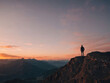 © Pixel Matrix - A Man Standing On Top Of A Mountain