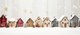 Fototapeta Uliczki - Vintage white wooden background with bell adorned little houses for Christmas