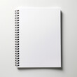 © Iridium Creatives - Fotografia de estilo mockup con detalle y textura de libreta de anillas con hojas en blanco sobre fondo neutro