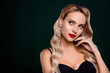 Portrait of gorgeous woman model hollywood wave hairstyle promoting bijouterie store over dark green background