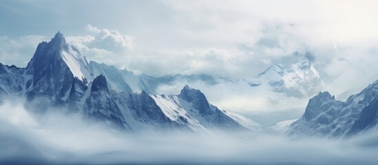 Wall Mural - snowy mountain range panorama with melting glaciers and thick fog