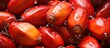 © 2rogan - Close up photo of mature red palm fruit used for palm oil industry as commodity and for cooking vegetable oil fuel and energy