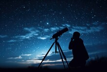 An Amateur Astronomer Peering Through A Telescope Under A Starlit Sky.