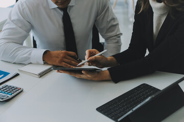 Close up of Business team analyzing income charts and graphs with modern laptop computer. Business analysis and strategy concept.