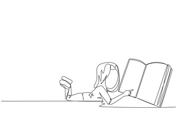 Poster - single continuous line drawing girl lying on her stomach reading a big book. enjoy reading books in 