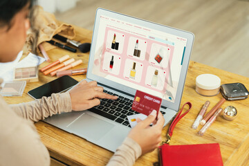 Woman shopping online on internet marketplace browsing for sale items for modern lifestyle and use credit card for online payment from wallet protected by crucial cyber security software