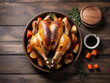 Roasted chickens isolated on wooden background with copy space. thanks giving concept