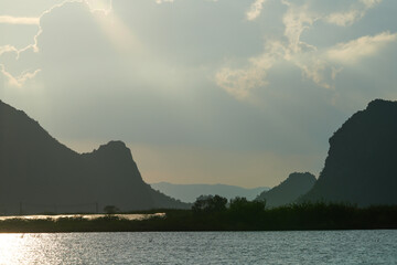 Wall Mural - Mountain view at sunset In the national park, enter Sam Roi Yot. Prachuap Khiri Khan Province, Thailand