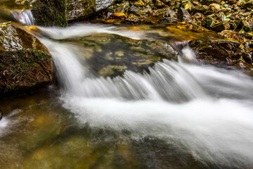 Wall Mural - A beautiful mountain stream with large stones. HDR Image (High Dynamic Range).