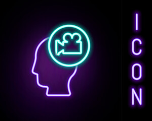 Poster - Glowing neon line Head with camera icon isolated on black background. Video camera. Movie sign. Film projector. Colorful outline concept. Vector
