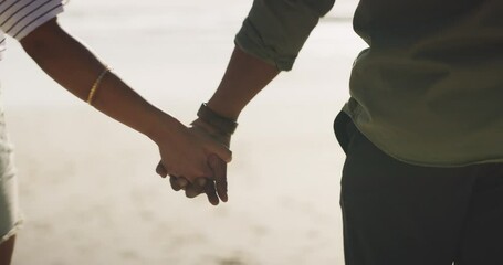 Poster - Couple, love and trust by holding hands on beach for walk, wellness and relaxation on trip. Man, woman and back view for marriage with support, care or bond in relationship for travel together