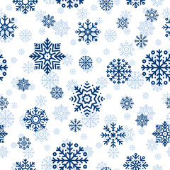 Canvas Print - Seamless Christmas pattern with blue snowflakes on white background. Winter decoration. Happy new year, cold season snowfall. Vector illustration