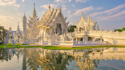 White temple Chiang Rai during sunset, view of Wat Rong Khun or White Temple Chiang Rai, Thailand