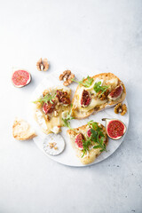 Sticker - Baked camembert cheese with figs and honey on toast