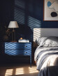 blue wall and bedside table in bedroom interior. Game of shadows on a wall from window at the sunny day. Scandinavian or boho home decor.