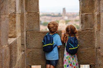 Wall Mural - Young tourists wandering around at French fortress, Carcassonne