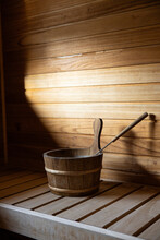 Wood Sauna With Water Bucket And A Scoop
