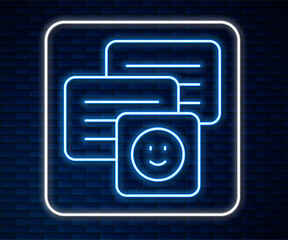 Poster - Glowing neon line New chat messages notification on laptop icon isolated on brick wall background. Smartphone chatting sms messages speech bubbles. Vector