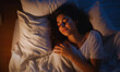 young woman sleeping in bed at night 
