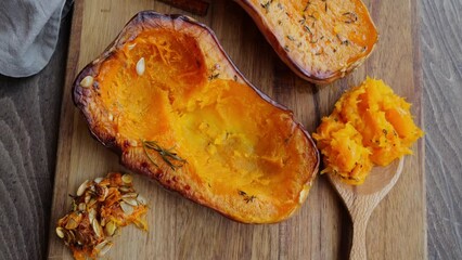 Wall Mural - Baked pumpkin with cinnamon, pour honey over it. Close up