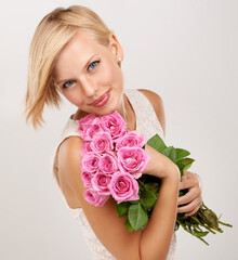 Poster - Rose, bouquet and smile with portrait of woman in studio for floral, young and romance. Plants, gift and happy with female person and flowers on white background for elegant, love and present