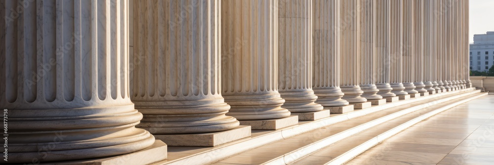 Stone pillars colonnade and marble stairs detail. Classical columns row ...