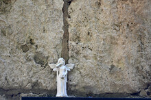 A Small, White Sandstone Sculpture Of An Angel On A Cemetery In Weimar-Germany.