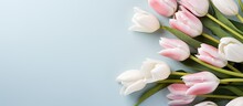 Mothers Day Concept Flowers On Pastel Blue Background