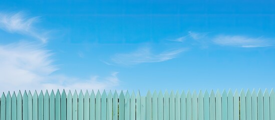 Poster - Wooden fence against blue sky