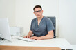 © Svitlana - Doctor works at a computer in the workplace
