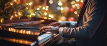 Young Man Playing Piano Keys Bokeh Light Christmas Night Copy Space