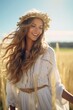 © GoldenART - Beautiful young woman with long curly hair in a wheat field.