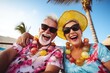 Retired husband and wife on vacation, in bright clothes against the background of palm trees