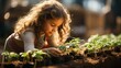 Little girl with vegetable plants farming and gardening concept. Daughter planting vegetable in home garden field use for people family