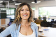 © Wavebreak Media - Portrait of happy caucasian casual businesswoman with blond hair in creative office