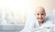 Bald child in hospital, being treated for cancer