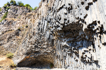 Sticker - symphony of the stones - natural basalt walls of Garni gorge in Armenia on sunny autumn day