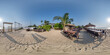 360 hdri panorama with coconut trees on ocean coast near tropical shack or open cafe on beach with swing in equirectangular spherical seamless projection