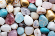 Colored pebbles - blue, pink, red, gold and white.  Smooth and pretty