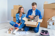 © gorynvd - Young couple unpacking things after moving into new house