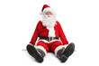 © Ljupco Smokovski - Funny Santa sitting on the ground and looking at camera