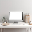 © Boris - Modern personal computer with a blank white screen, keyboard, and office accessories on desk at workplace of graphic designer, blogger. Electronic devices, technology, and creativity