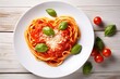 © dark_blade - Heart shaped spaghetti with tomato sauce and parmesan cheeses on white plate. AI Generated