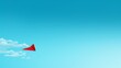 © Dina - Red paper plane flying in the blue sky with copy space for your text
