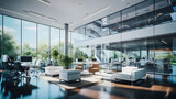 Fototapeta  - Beautiful photo of a clean and cozy office with big windows. Lots of sunlight creates a pleasant working atmosphere in a large open office space